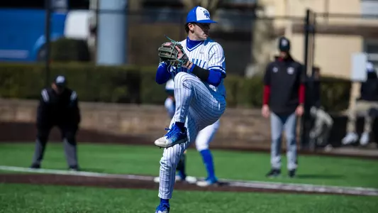 Ryan Reich throws a pitch against UMass