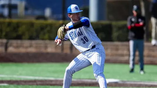 Cole Hansen throws a pitch in a game against UMass