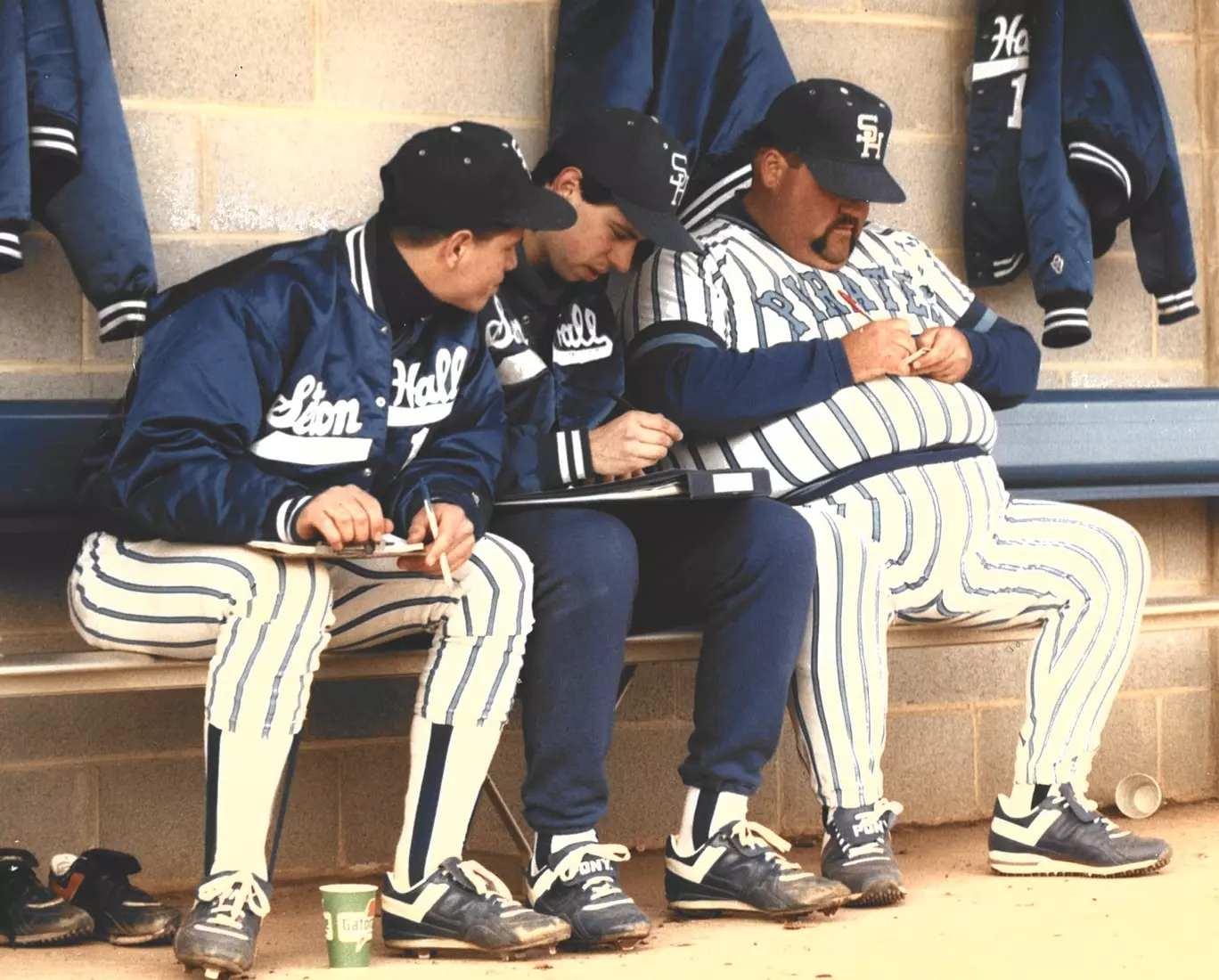 Michael Cocco takes notes in the Seton hall dugout during the 1989 season.
