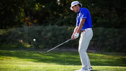Wanxi Sun makes a chip from the fringe during a practice round in 2023