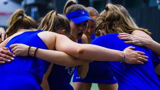 Tennis Team Huddle