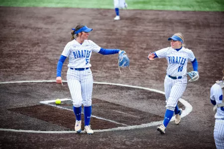 Sydney Babik and Caroline Hobbes High Five