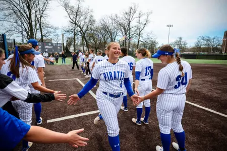 Kelsey Carr Running through high-five line