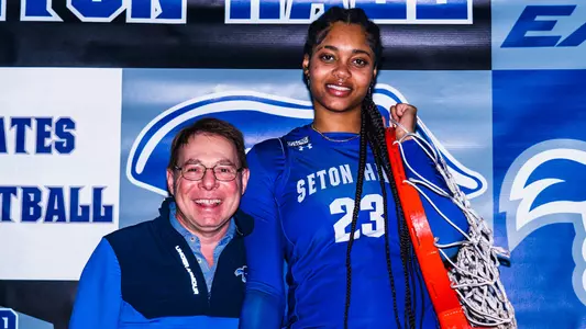 Ramani Parker poses with Seton Hall head coach Anthony Bozzella during her recruiting visit during the spring of 2024.