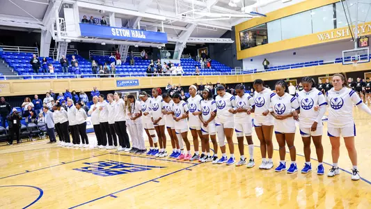 The Seton Hall women's basketball team lines up for the National Anthem prior to a game during the 2023-24 season.