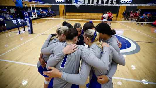 The Seton Hall volleyball team huddles together prior to the start of its match against NJIT in September of 2023.