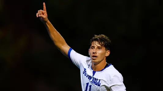Jared Smith pointing during the match vs. UAlbany