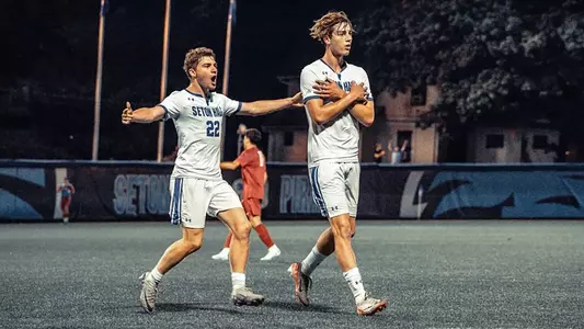 Til Kauschke (right) celebrates with Jack Kossoudji