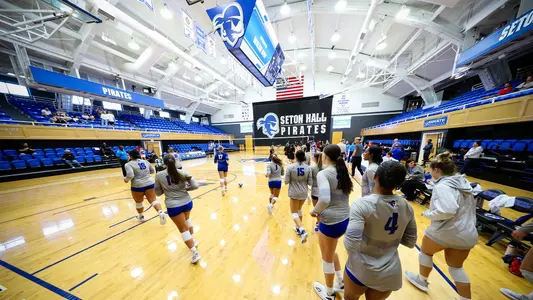 Seton Hall volleyball team heads onto the court prior to its contest against Sacred Heart on Sept. 6.