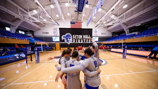 The Seton Hall volleyball team huddles in Walsh Gym prior to its match against Sacred Heart on Sept. 6