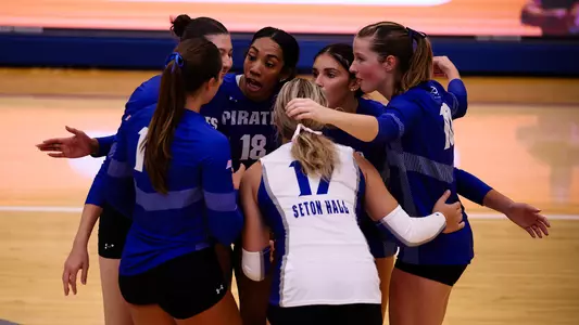 The Seton Hall volleyball team huddles during its game against Kent State on Sept. 8
