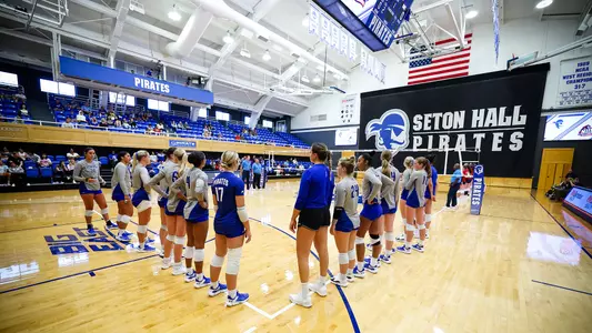 The Seton Hall volleyball team lines up prior to a match during the 2023 season.