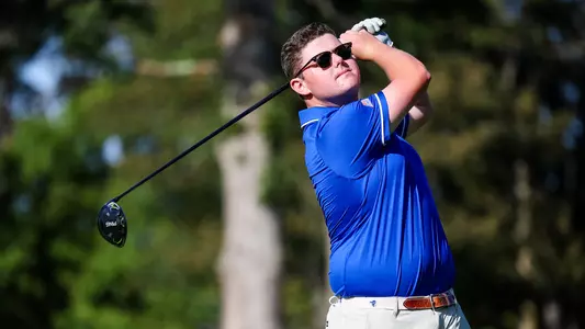 Angus O'Brien takes a swing during a practice round in the fall of 2023.