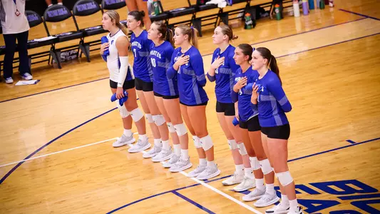 The Seton Hall volleyball starting lineup stands for the national anthem prior to its match against Kent State on Sept. 8.