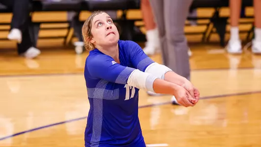 Rylee Nelson digs the volleyball against Sacred Heart on Sept. 6.