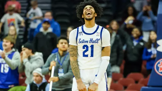Isaiah Coleman celebrates against DePaul