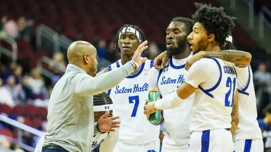 Seton Hall huddles at a timeout against DePaul