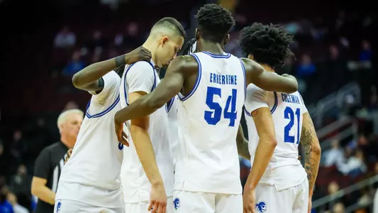 Seton Hall huddles against Marquette