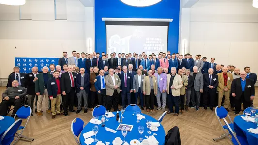 The 2025 Hall of Fame Class with members of the 2025 baseball team
