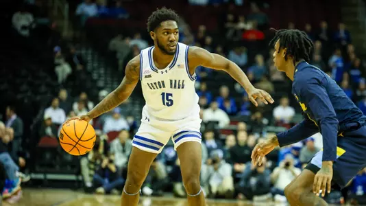 Jahseem Felton handles the ball against Marquette