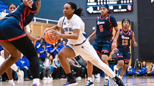 Savannah Catalon drives to the hoop against St. John's on Jan. 25