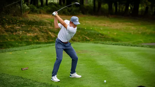 Will Hennessee tees off during a practice round in the fall of 2024.