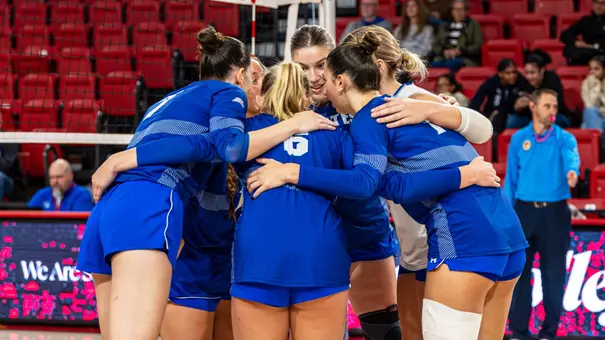 Seton Hall volleyball team huddles at St. John's.