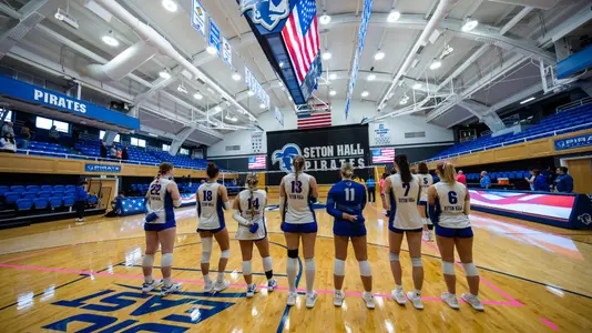 Seton Hall lines up for the National Anthem prior to a volleyball game