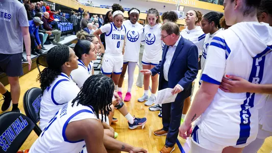 Seton Hall WBB Team huddles around head coach Tony Bozzella prior to the start of its game against Saint Peter's on Nov. 4