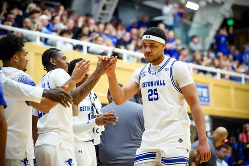 Najai Hines High Fiving Teammates