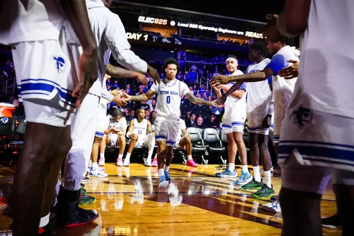 Budd Clark Walking Through Handshake Line During Pregame Introductions vs Saint Peter's