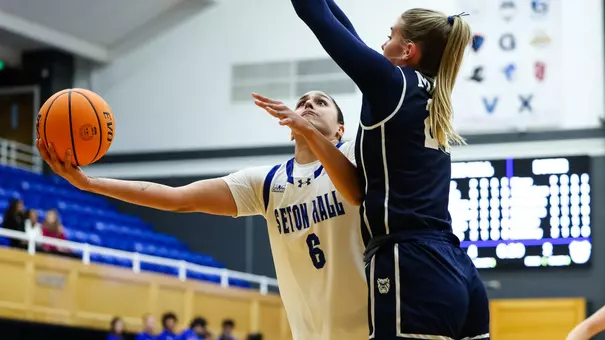Mariana Valenzuela drives past a Butler defender on Dec. 4