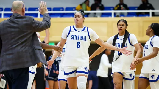 Mariana Valenzuela high-fives her teammates and coaches during Seton Hall's game vs. Butler on Dec. 4