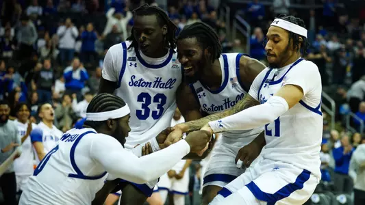 Dylan Addae-Wusu is helped up by his teammates against Providence