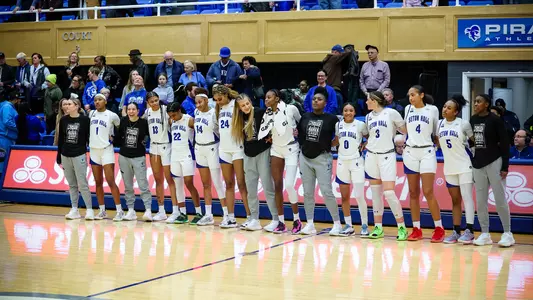 Seton Hall WBB team lines up during the Seton Hall alma mater after defeating Xavier on Feb. 8