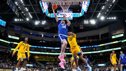 Gus Yalden goes up for a layup at Marquette