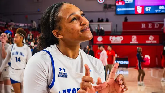 Savannah Catalon puts up a "W" for win after defeating St. John's on Feb. 23