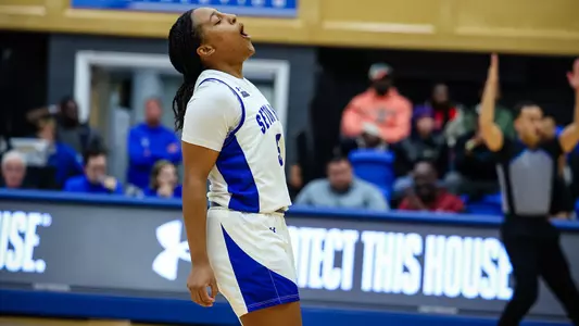 Savannah Catalon reacts after hitting a three-pointer against Sacred Heart on Dec. 9