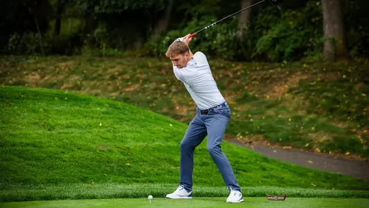 George Fricker tees off during a practice round in the fall of 2024