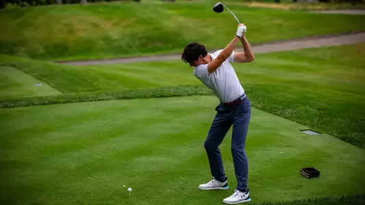 Luke Nolan takes a swing during a practice round in the fall of 2024