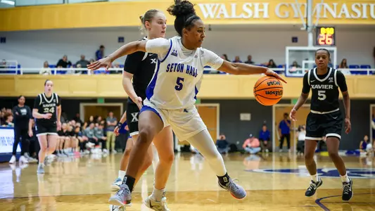 Savannah Catalon steals the ball away from Xavier on Feb. 8