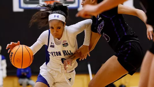 Jada Eads drives past a defender against Portland on March 23.