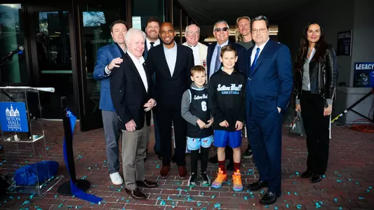 On hand to cut the ceremonial ribbon were Monsignor Joseph R. Reilly, S.T.L., Ph.D., Director of Athletics Bryan Felt '97, Board of Regents Chair Hank D’Alessandro ’85, Regent Patrick Murray '64, MBA '72, members of the Frungillo family including Al and Michael Frungillo '96, University VP for Advancement Jon Paparsenos '99 and Seton Hall men's basketball head coach Shaheen Holloway '00.