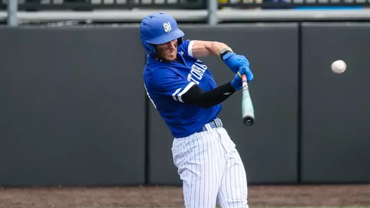 Aiden Robbins takes a swing against Marist