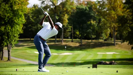 Isaiah Williams takes a tee shot during a practice round in the fall of 2024