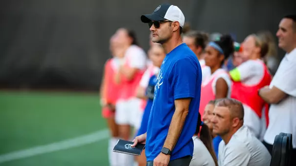 Josh Osit stands on the sideline in a game against Marist