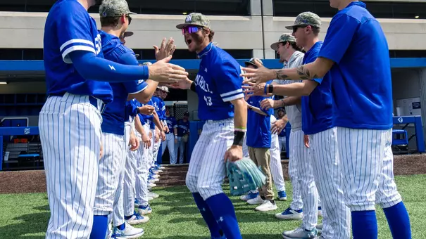 Aiden Robbins comes out of the Pirates' tunnel prior to a game at Mike Sheppard, Sr. Stadium.