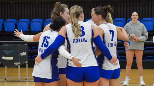 Seton Hall volleyball team huddle