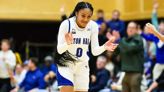 Jada Eads applauds during a game in the 2024-25 season