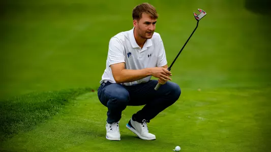 George Fricker sizes up a putt during a practice round in the fall of 2024.